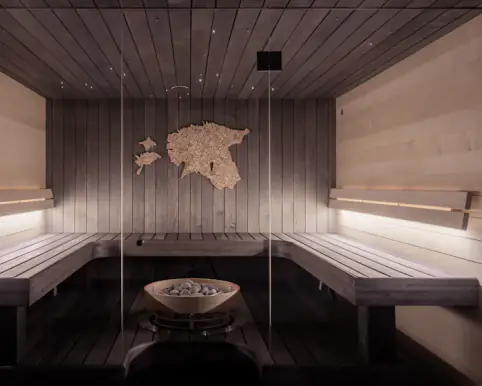 Sauna en bois clair, éclairage tamisé